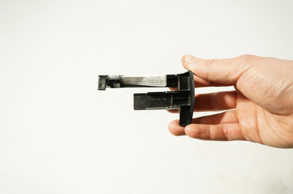 Front passenger seat rail trim (8)