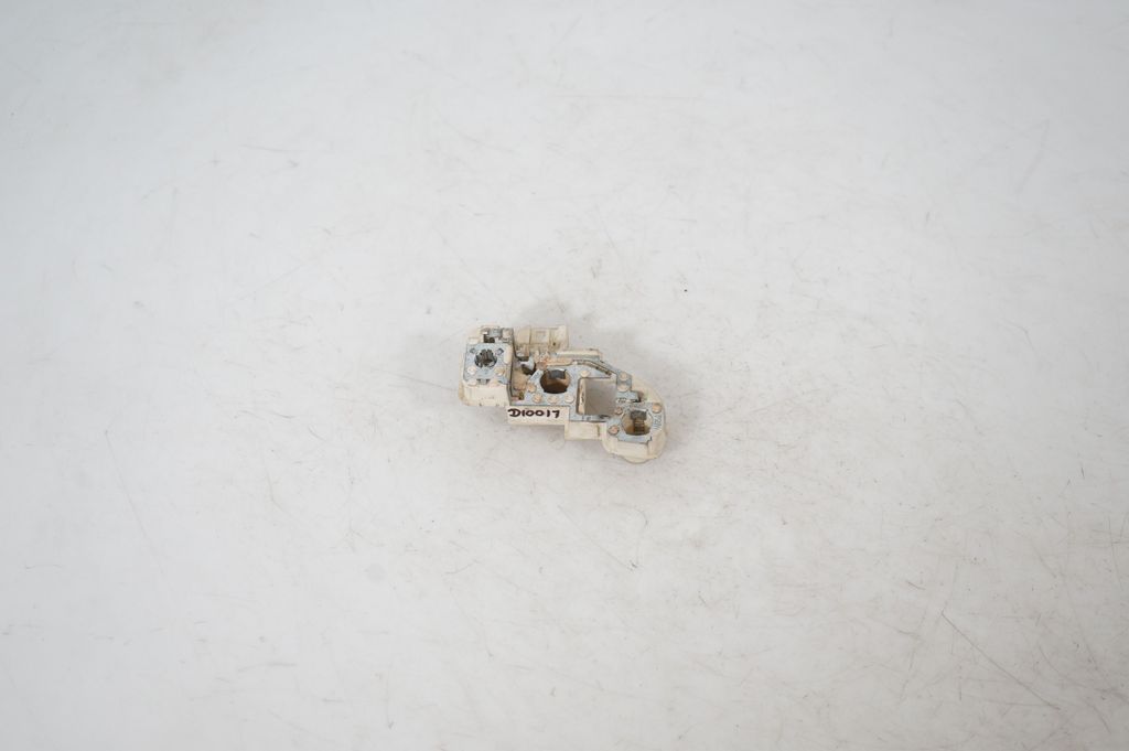 Tail light bulb cover holder