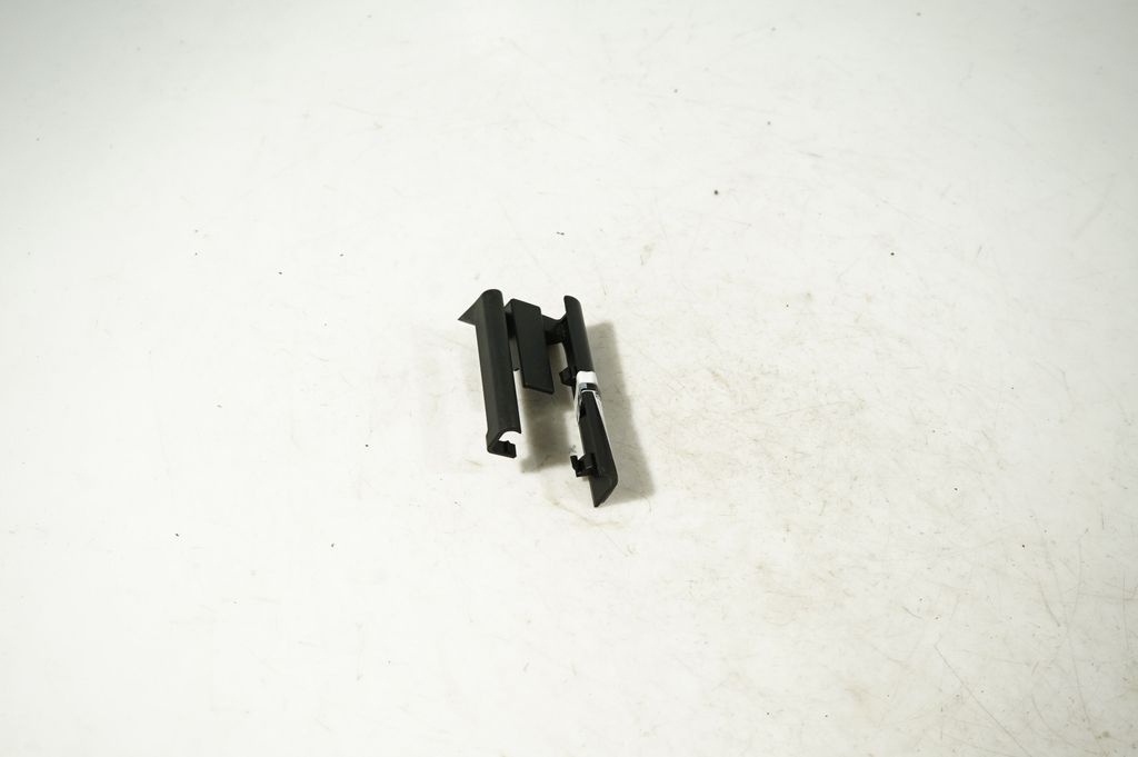 Front passenger seat rail trim (4)