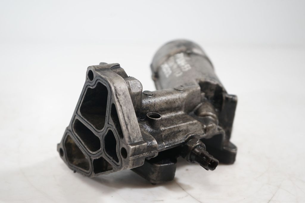 Oil filter mounting bracket (9)