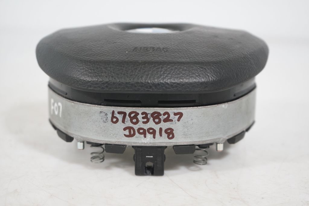 Front shock absorber with coil spring (9)