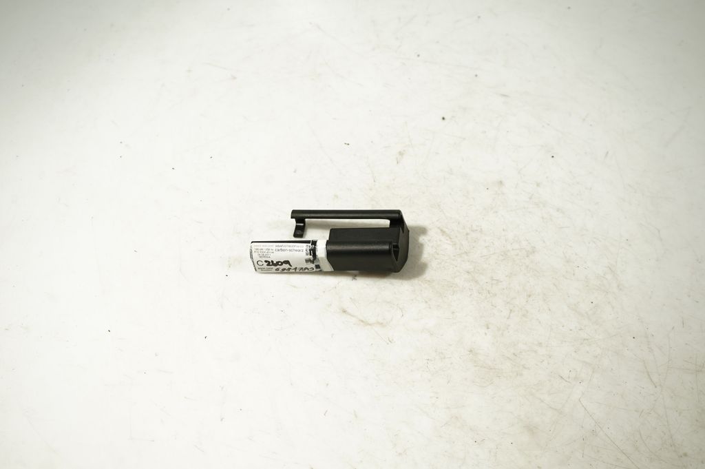 Front passenger seat rail trim (5)