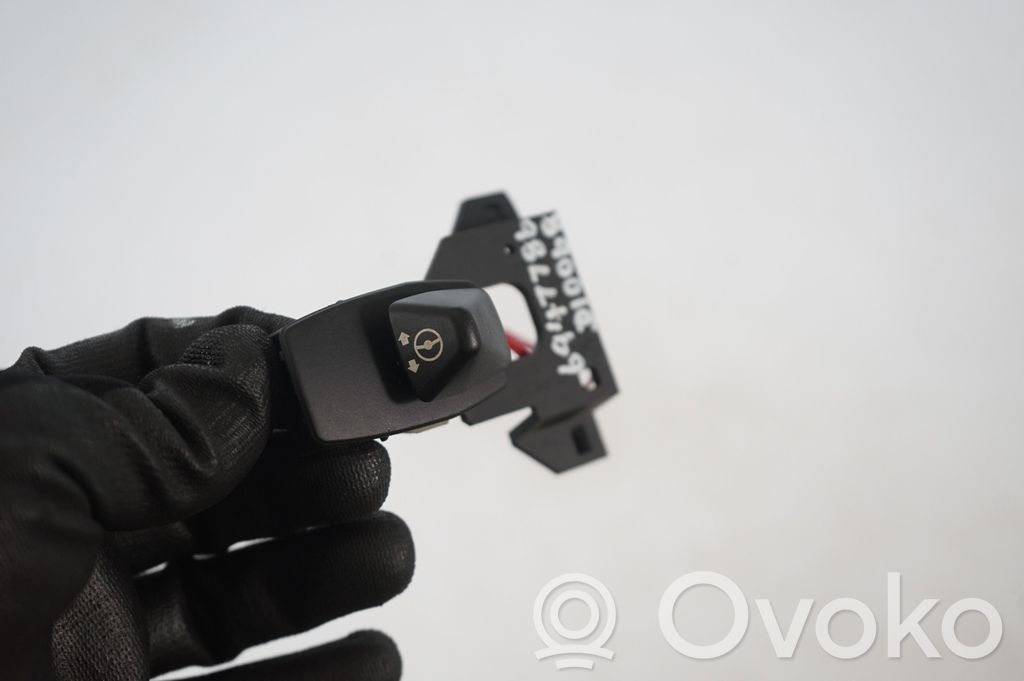 Steering wheel adjustment switch (7)