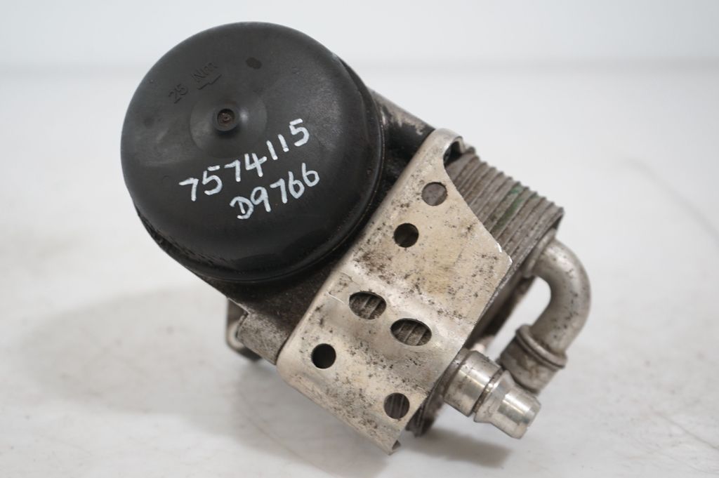 Oil filter mounting bracket (9)