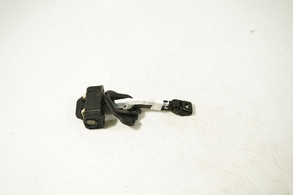 Front door check strap stopper (5)