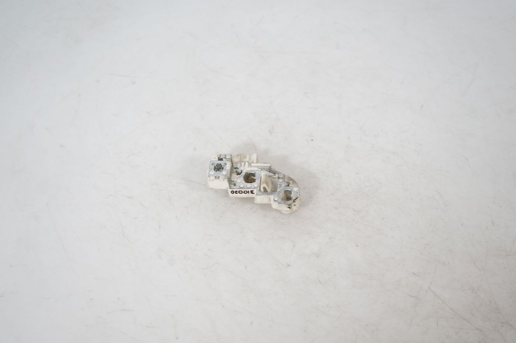 Tail light bulb cover holder