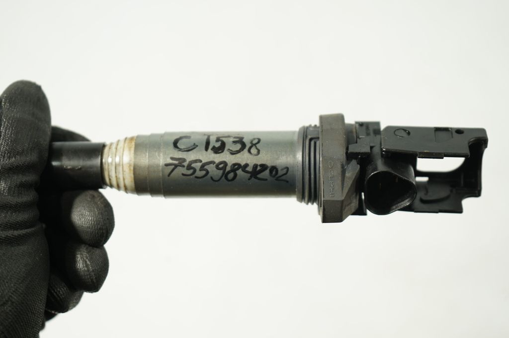 High voltage ignition coil (7)