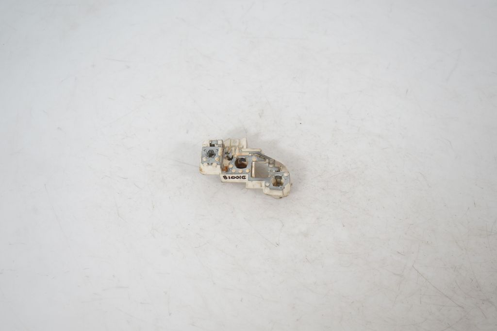 Tail light bulb cover holder