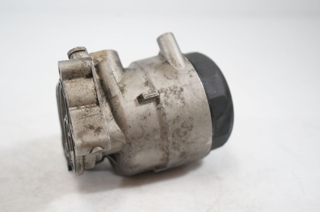 Oil filter mounting bracket (8)