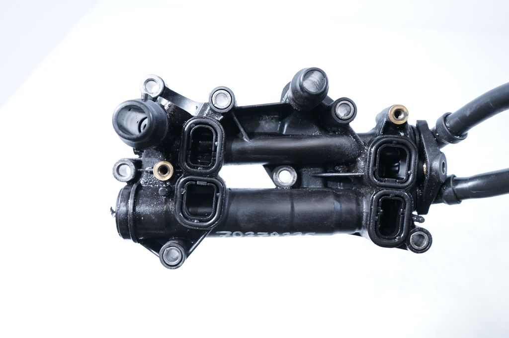 Oil filter mounting bracket (7)