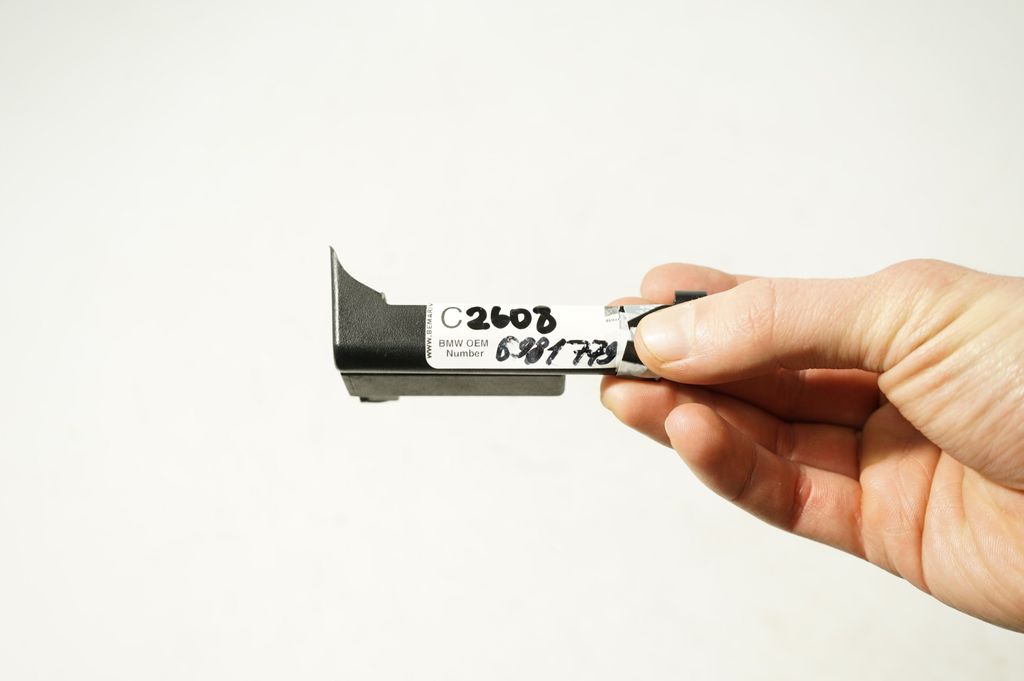 Front passenger seat rail trim (9)