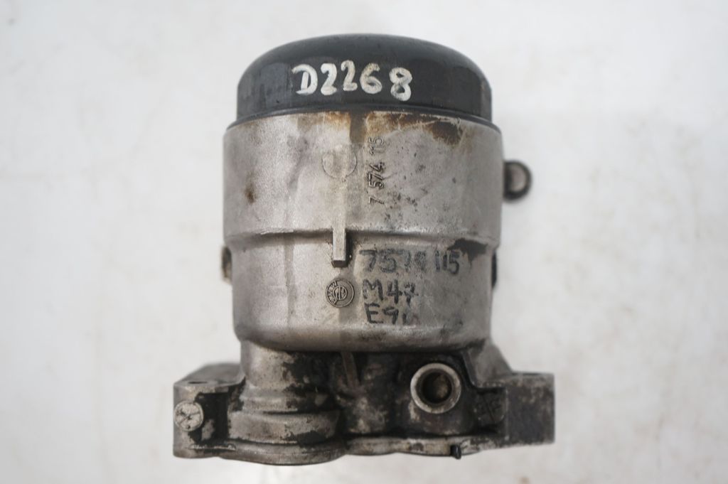 Oil filter mounting bracket (10)