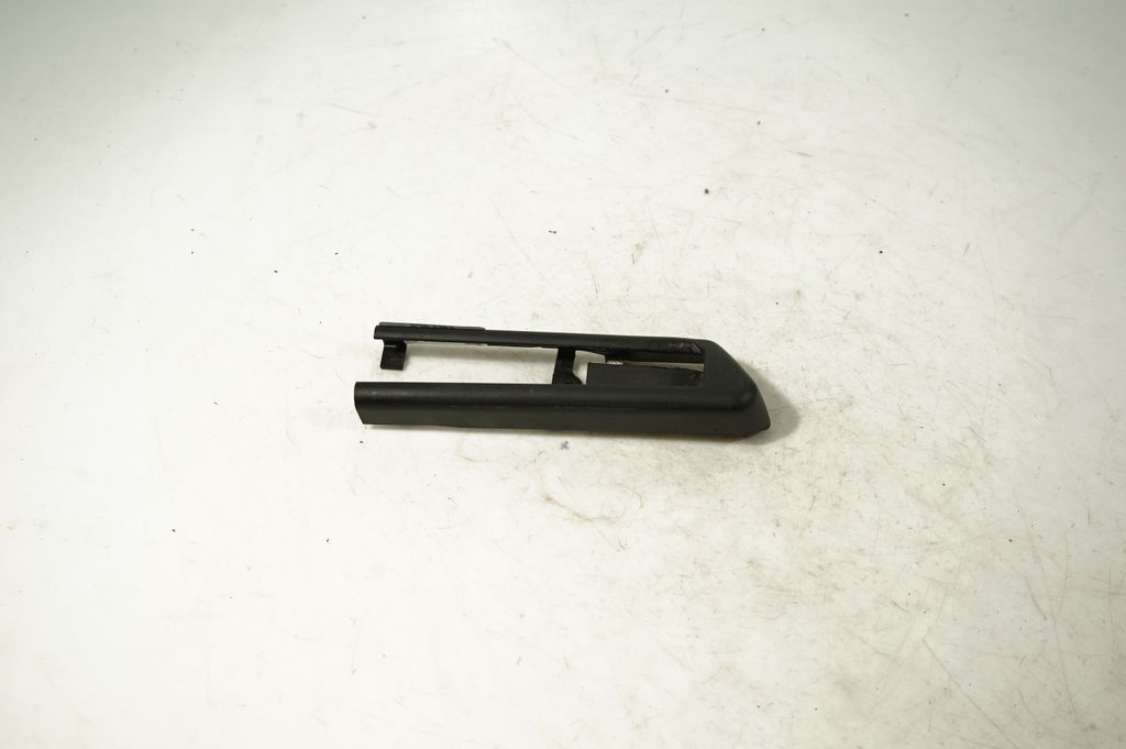 Front passenger seat rail trim (5)