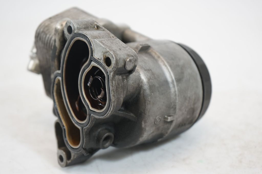 Oil filter mounting bracket (8)